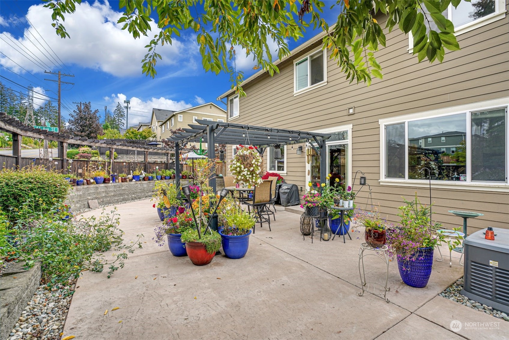 4029 180th Place Southeast Bothell, WA 98012 - Photo 33 of 33 a view of a chairs and tables in patio