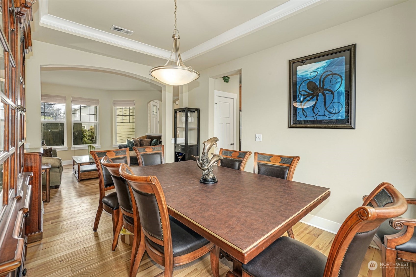 4029 180th Place Southeast Bothell, WA 98012 - Photo 7 of 33 a view of a dining room with furniture window and wooden floor
