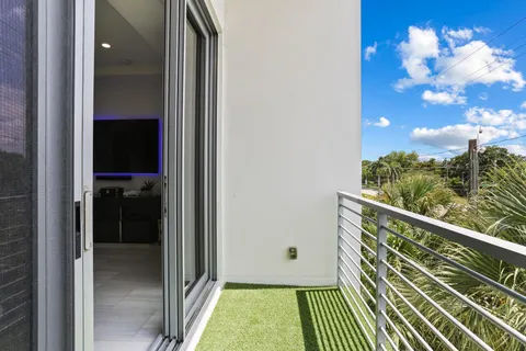 a bathroom with a shower sink double vanity and mirror