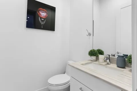 a view of a house with backyard porch and garden