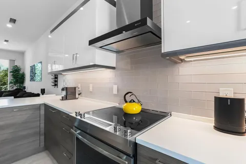 a view of a dining room with furniture window and flowerpot