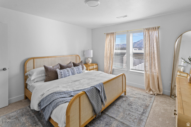 1264 West 500 South, Unit 320 Logan, UT 84321 - Photo 15 of 39 Carpeted room with white walls, a single window featuring horizontal blinds, and a flush-mount ceiling light