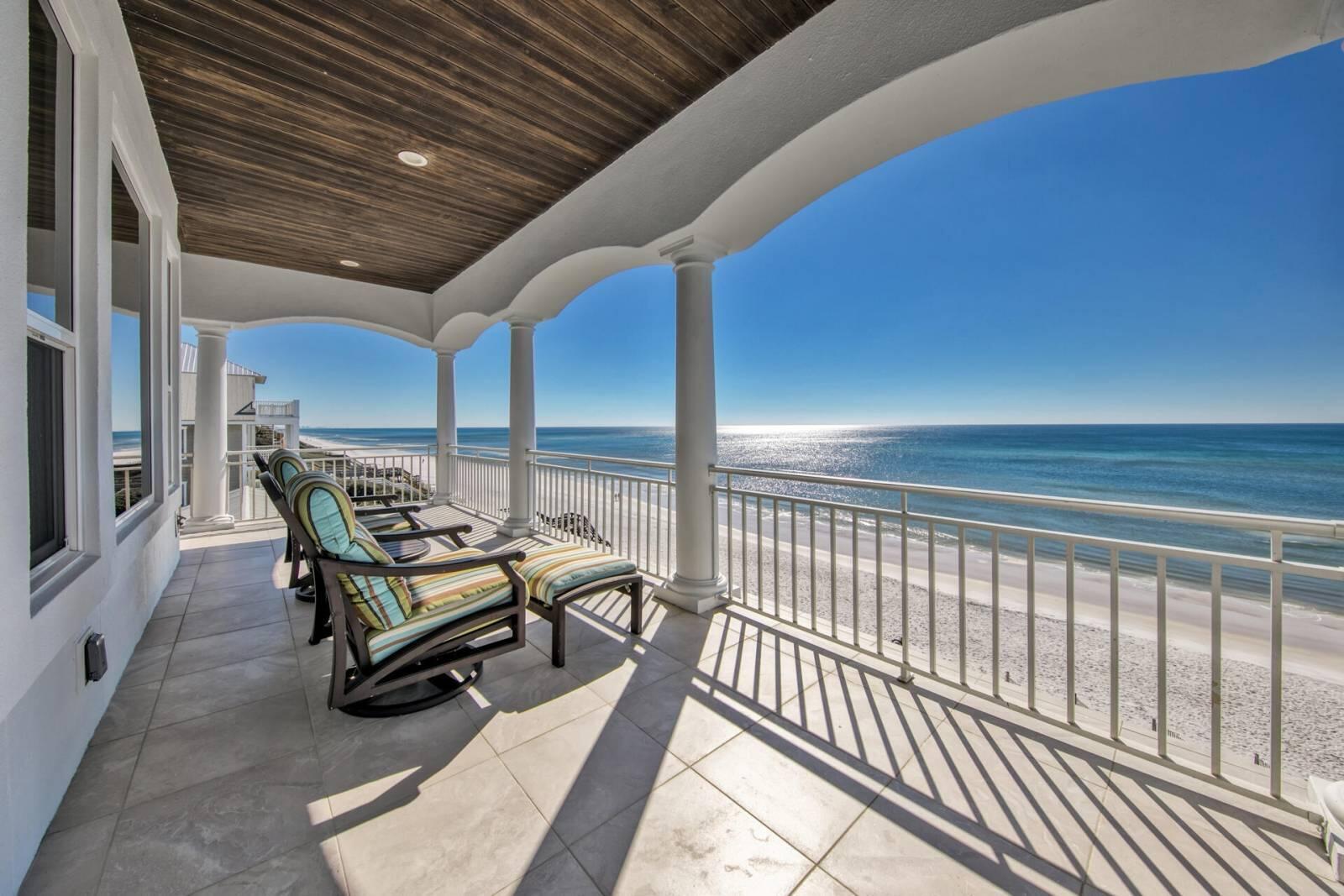 8034 East County Highway Inlet Beach, FL 32461 - Photo 3 of 5 a sitting area with furniture and wooden floor