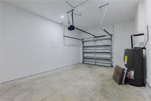 an aerial view of a house with a swimming pool