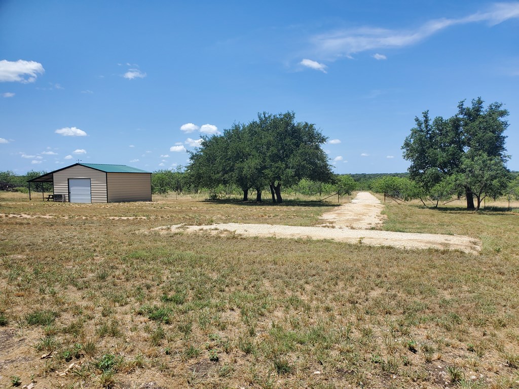 375 Hillside Road, Unit 20 Fort McKavett, TX 76841 - Photo 12 of 15 a view of swimming pool with an outdoor space