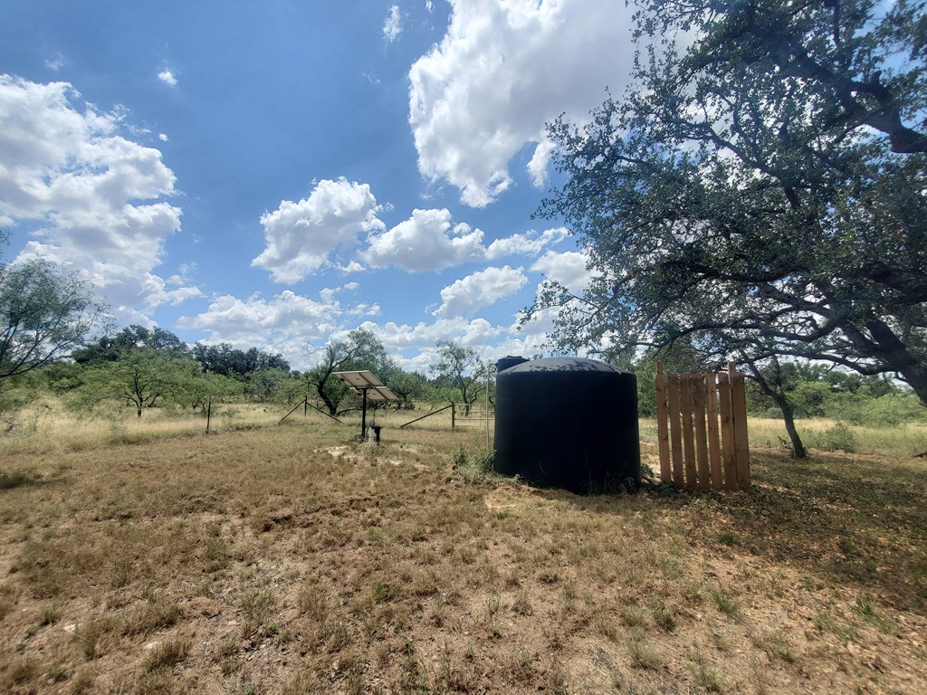 375 Hillside Road, Unit 20 Fort McKavett, TX 76841 - Photo 13 of 15 a backyard of a house with lots of green space