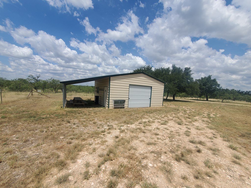 375 Hillside Road, Unit 20 Fort McKavett, TX 76841 - Photo 4 of 15 a view of a backyard