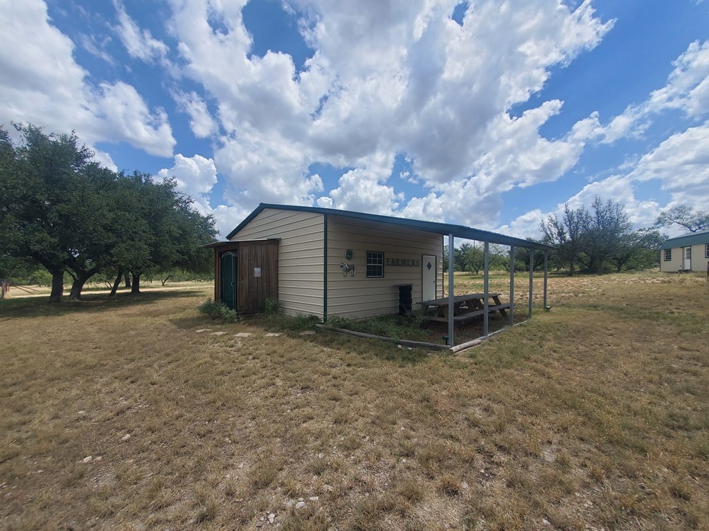 375 Hillside Road, Unit 20 Fort McKavett, TX 76841 - Photo 6 of 15 a view of a house with a yard