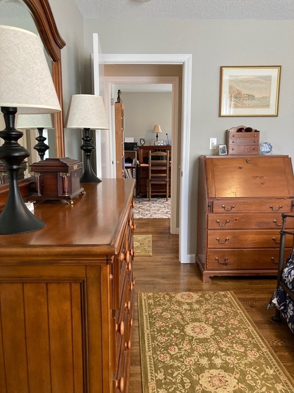 17 Brookside Drive Acushnet, MA 02743 - Photo 16 of 41 a living room with furniture and a dresser