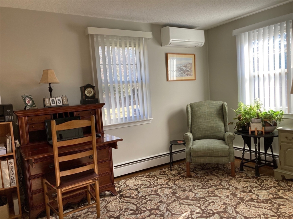 17 Brookside Drive Acushnet, MA 02743 - Photo 18 of 41 a living room with furniture and a window