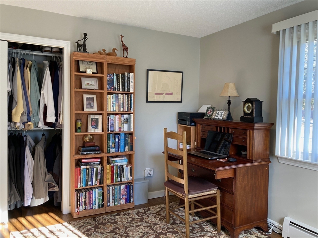 17 Brookside Drive Acushnet, MA 02743 - Photo 19 of 41 a view of a workspace with bookshelf