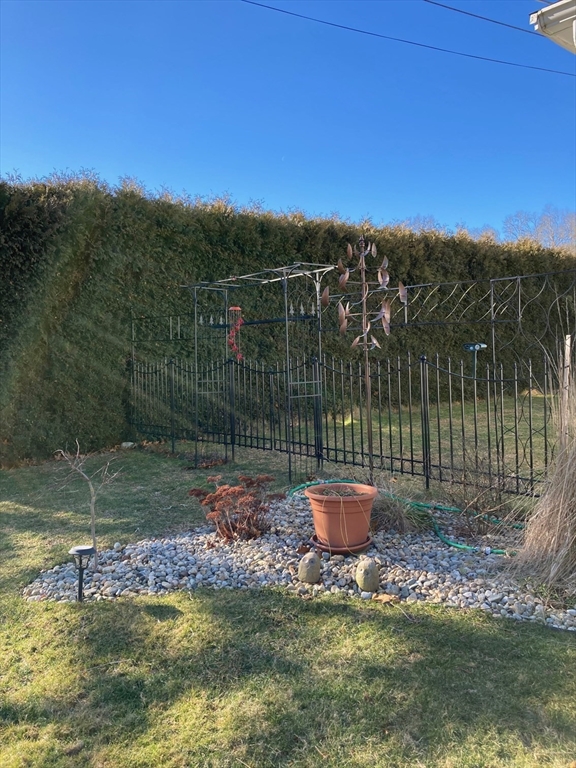 17 Brookside Drive Acushnet, MA 02743 - Photo 40 of 41 a view of a backyard with a fountain