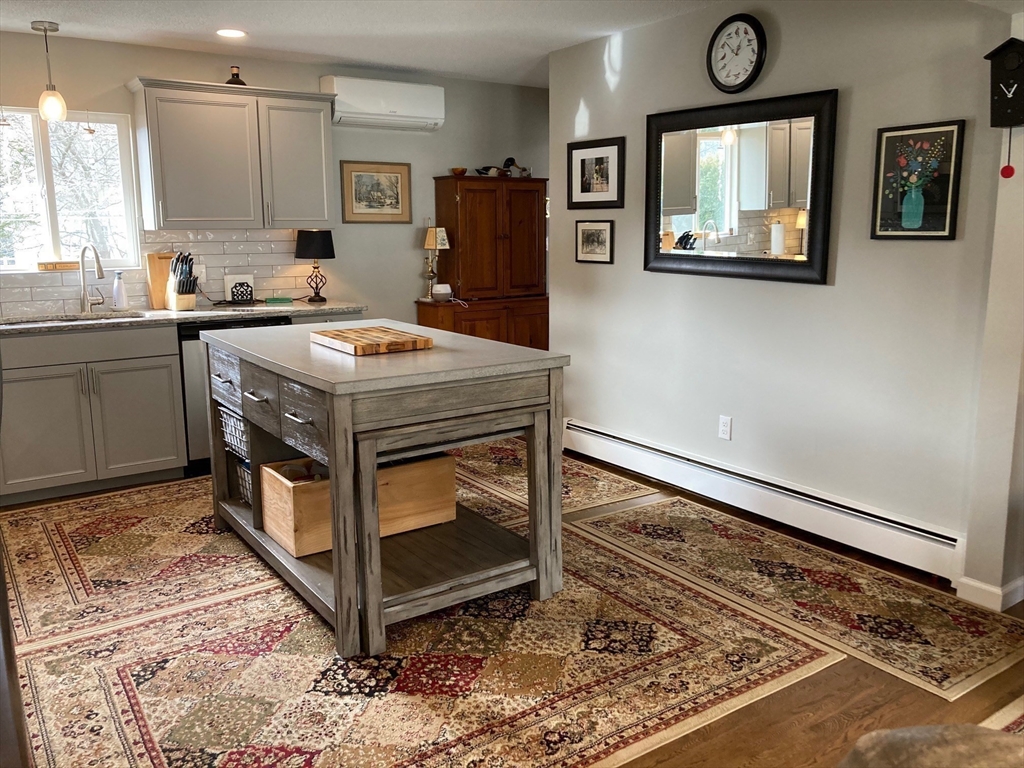 17 Brookside Drive Acushnet, MA 02743 - Photo 4 of 41 a kitchen that has a lot of cabinets in it