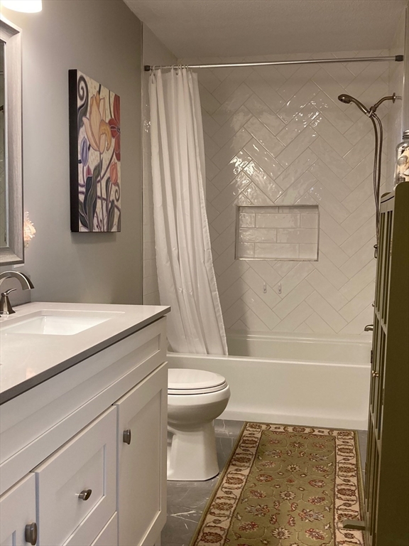 17 Brookside Drive Acushnet, MA 02743 - Photo 10 of 41 a bathroom with a sink a toilet and a bathtub