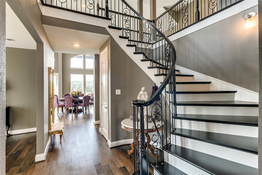2866 Shane Drive Midlothian, TX 76065 - Photo 16 of 40 a view of entryway livingroom and hall with wooden floor