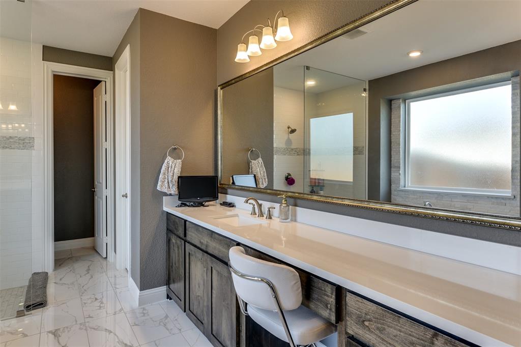 2866 Shane Drive Midlothian, TX 76065 - Photo 31 of 40 a bathroom with a sink and a mirror