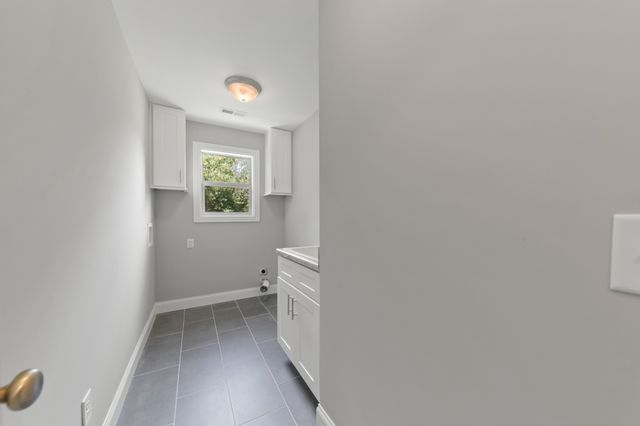 a bathroom with a walk in closet