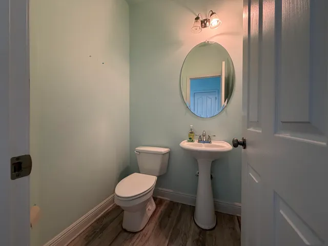 a bathroom with a toilet and a sink