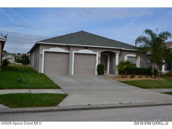 3882 Manitoba Way Rockledge, FL 32955 - Photo 1 of 20 The front of the property