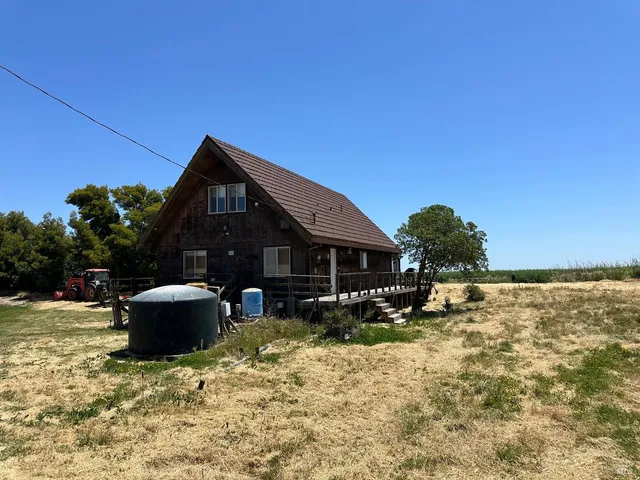 a front view of a house with patio