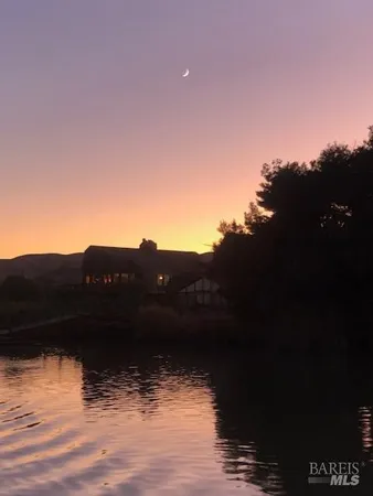 a view of a lake with a mountain in the background