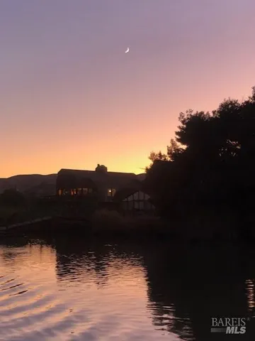 a view of a lake with a mountain in the background