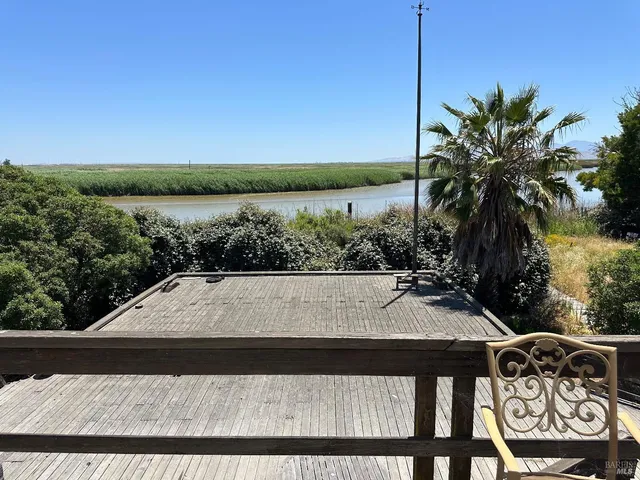 a view of swimming pool from a balcony