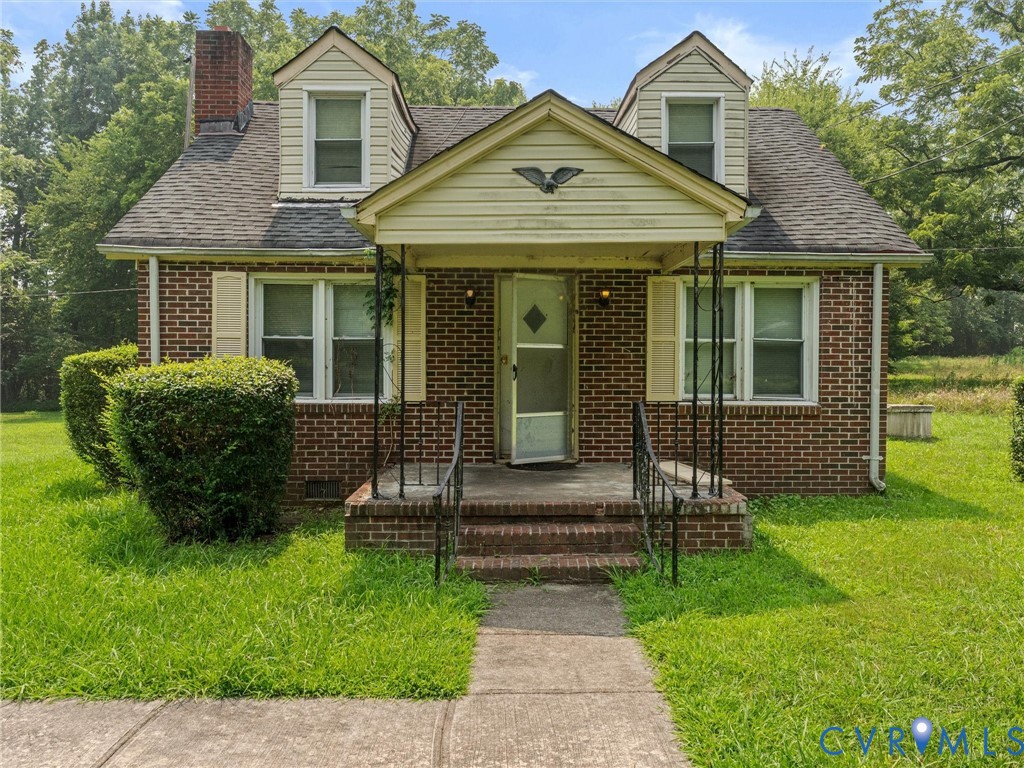 1593 Yellowbird Road Blackstone, VA 23824 - Photo 1 of 9 Brick exterior featuring a covered front porch wit