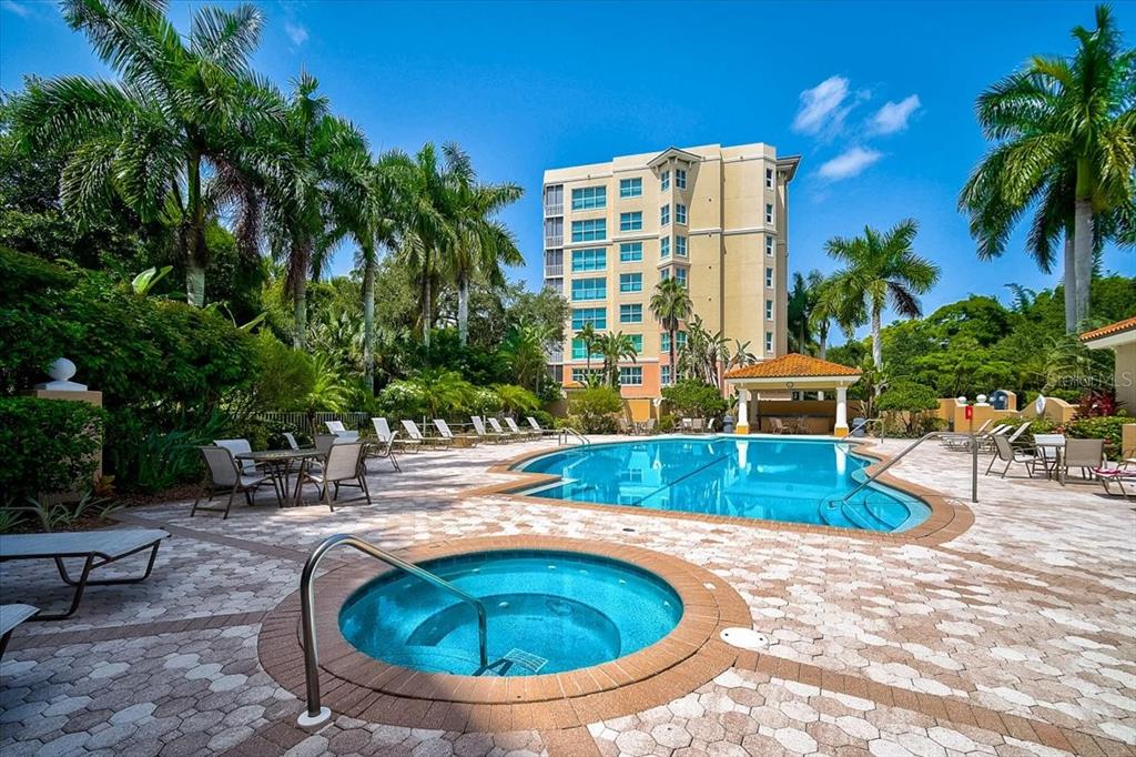 409 North Point Road, Unit 802 Osprey, FL 34229 - Photo 37 of 38 a view of outdoor space yard swimming pool and patio
