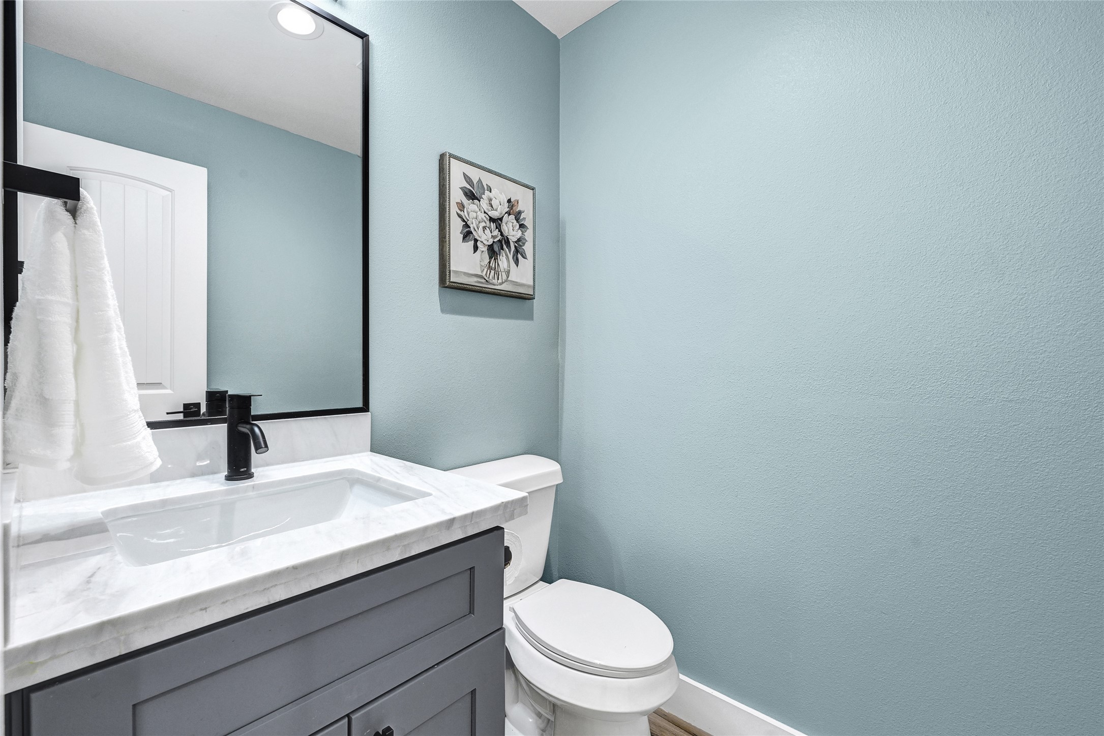 3557 Seabrook Street Houston, TX 77021 - Photo 19 of 37 a bathroom with a granite countertop toilet sink and mirror