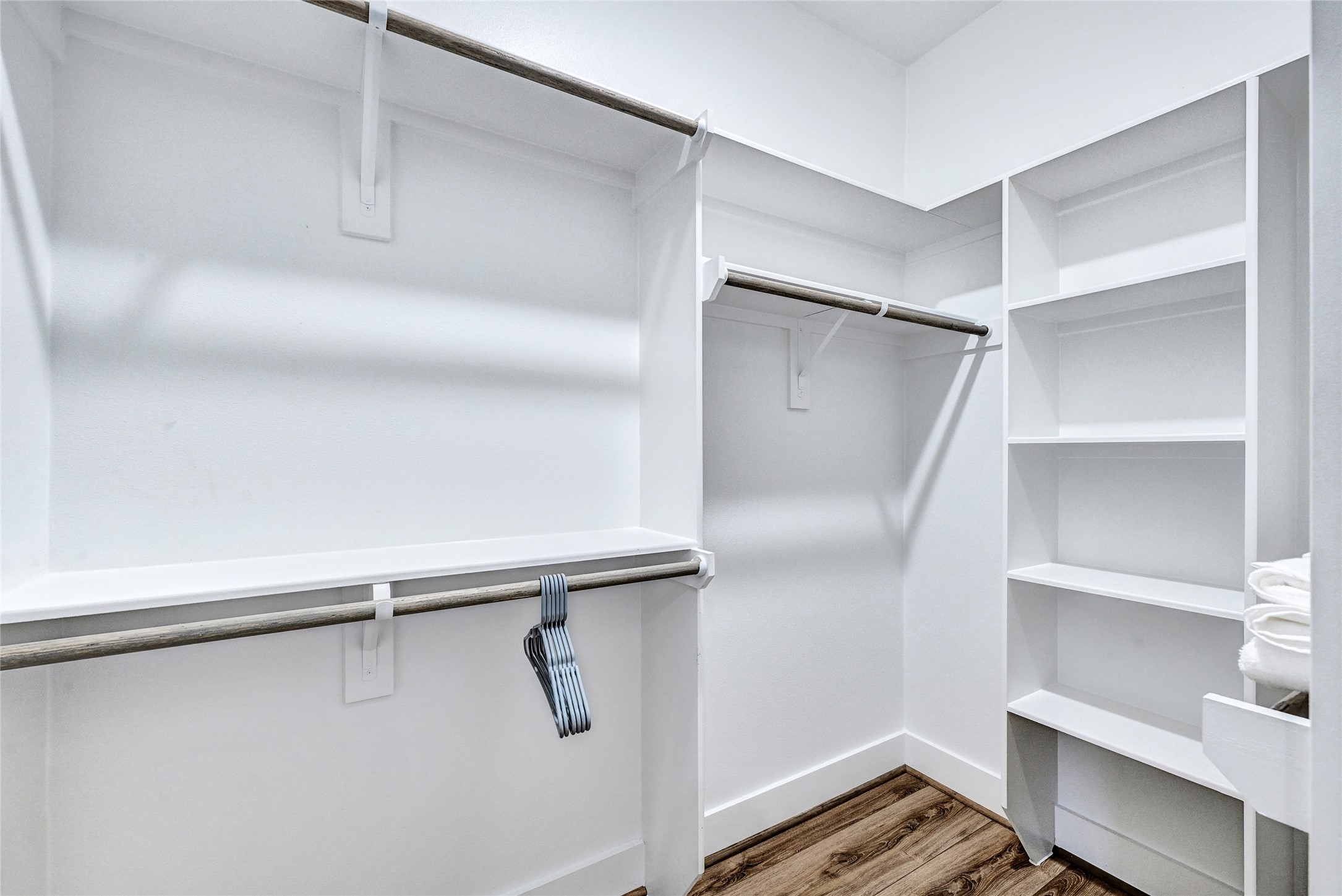 3557 Seabrook Street Houston, TX 77021 - Photo 23 of 37 a view of walk in closet with empty racks