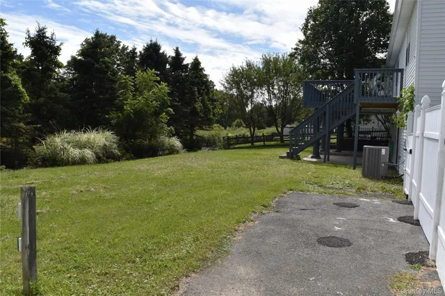 a view of a park with large trees