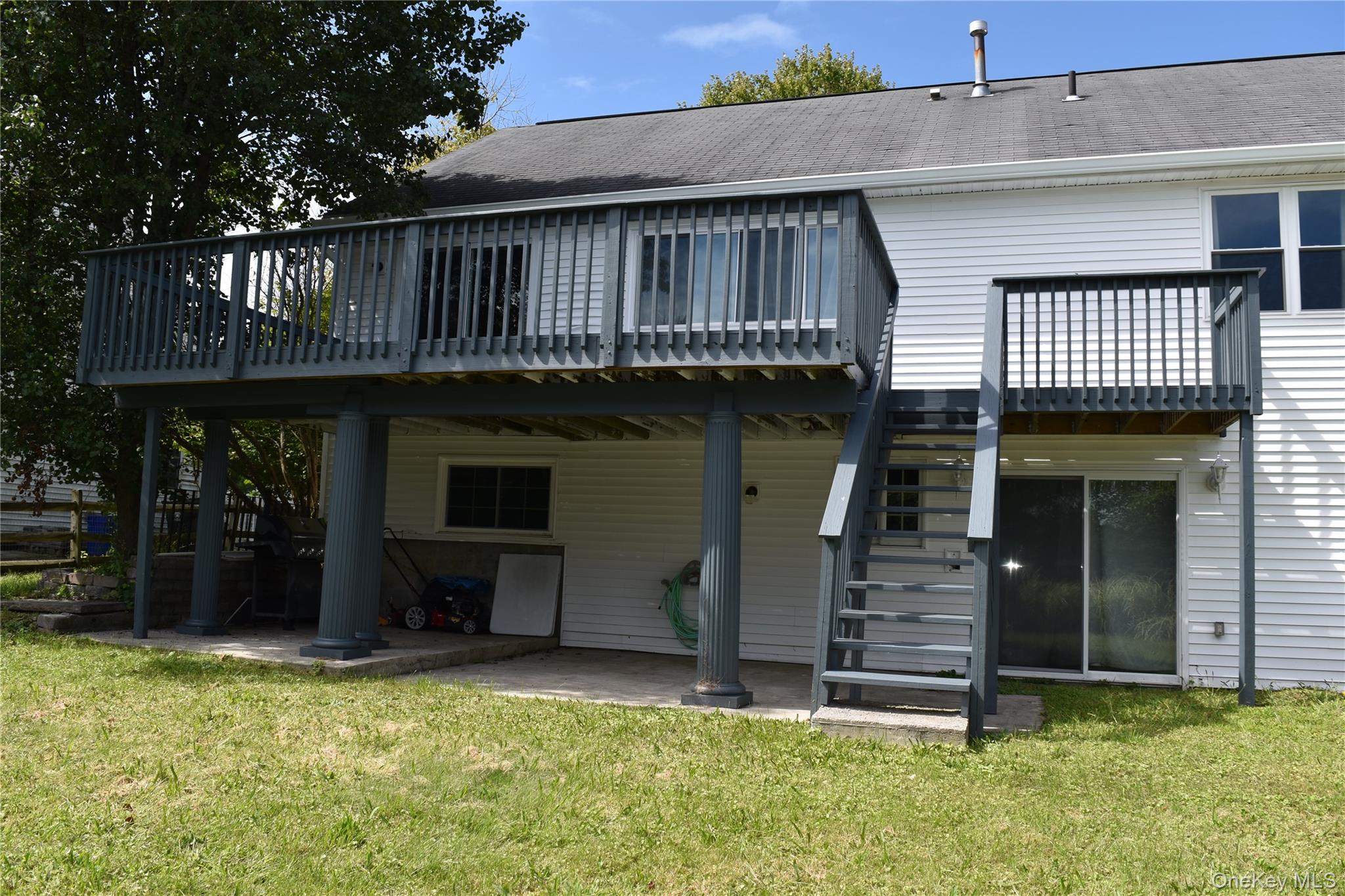 21 Walden Estates Road Walden, NY 12586 - Photo 23 of 32 Back of house featuring stairway, a patio area, a deck, and a lawn