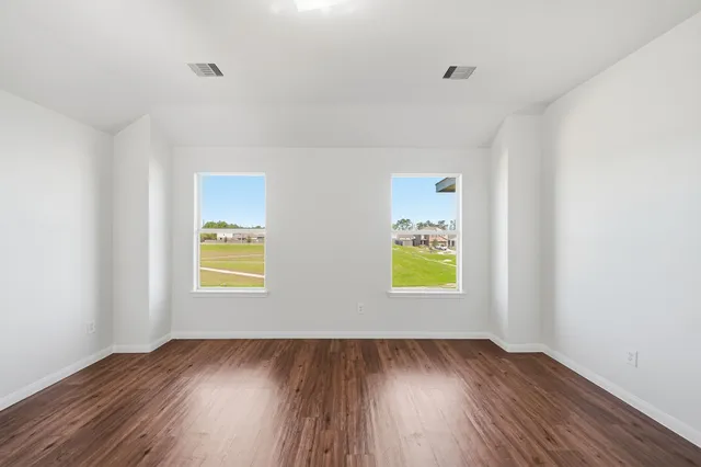 a view of an empty room and window