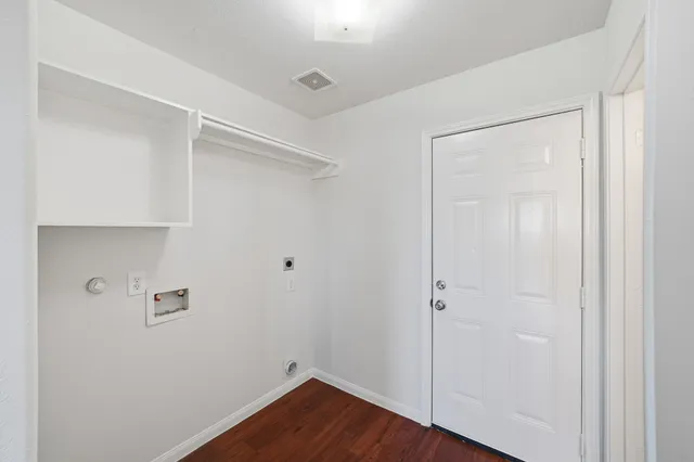 a view of room with hardwood floor