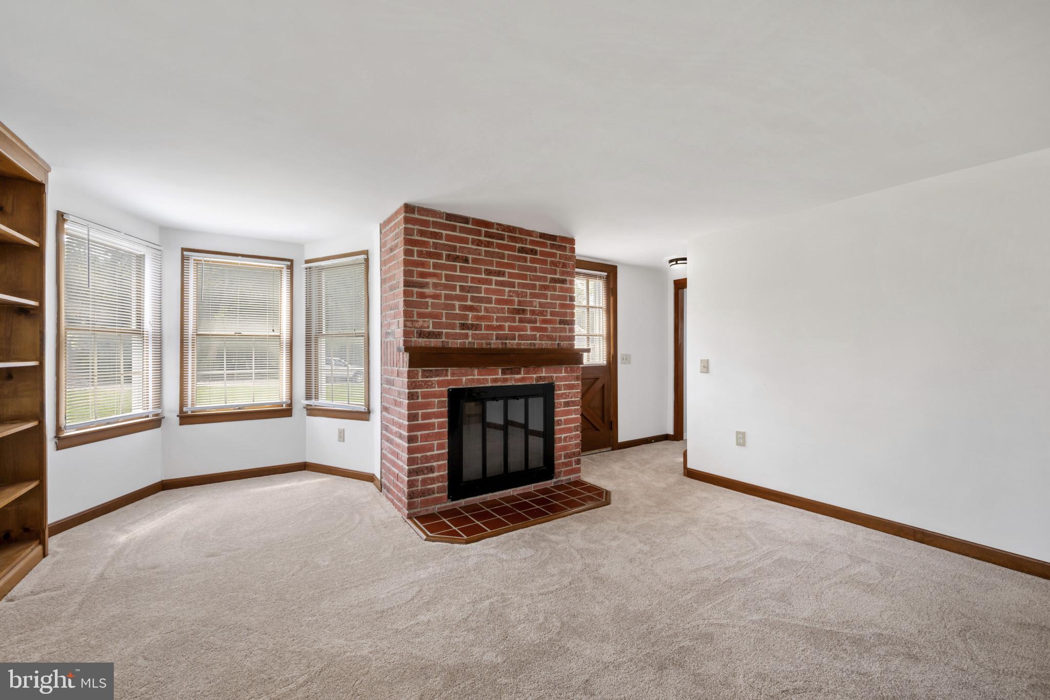 1912 Old New Windsor Road New Windsor, MD 21776 - Photo 2 of 36 Living room with a fireplace