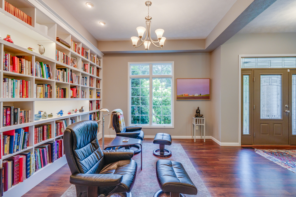 3550 East Bishop Road Mount Vernon, IL 62864 - Photo 11 of 61 a living room with furniture and a book shelf