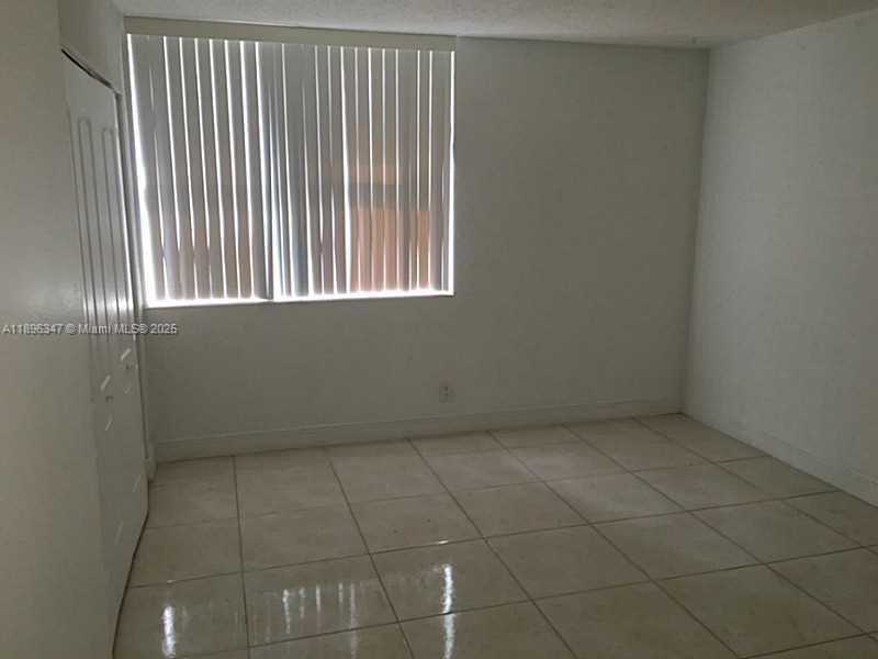 9001 Southwest 77th Avenue, Unit C308 Miami, FL 33156 - Photo 18 of 27 Exterior Front