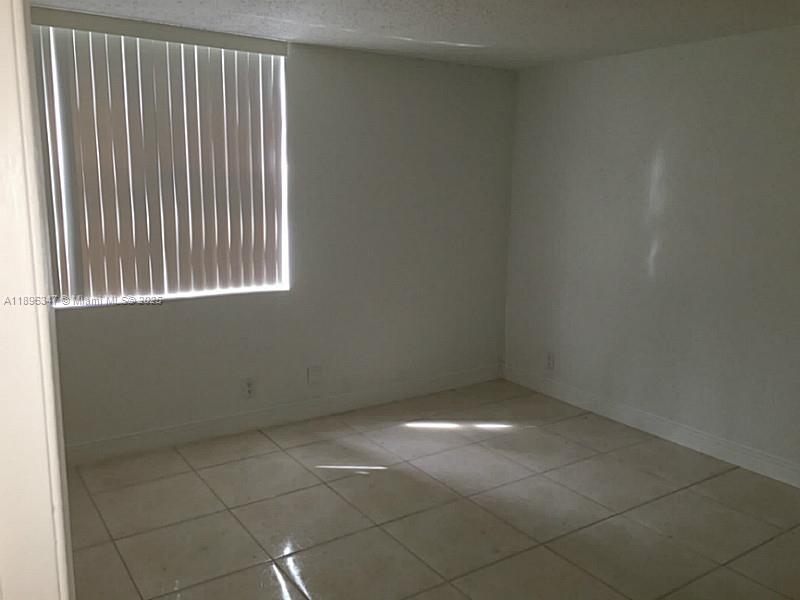 9001 Southwest 77th Avenue, Unit C308 Miami, FL 33156 - Photo 20 of 27 Exterior Front