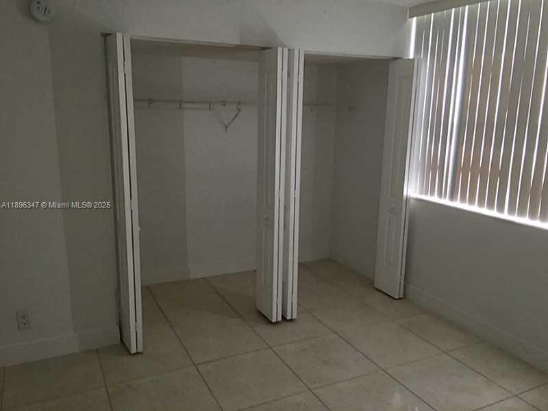 9001 Southwest 77th Avenue, Unit C308 Miami, FL 33156 - Photo 21 of 27 Exterior Front