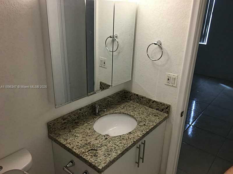 9001 Southwest 77th Avenue, Unit C308 Miami, FL 33156 - Photo 22 of 27 Exterior Front