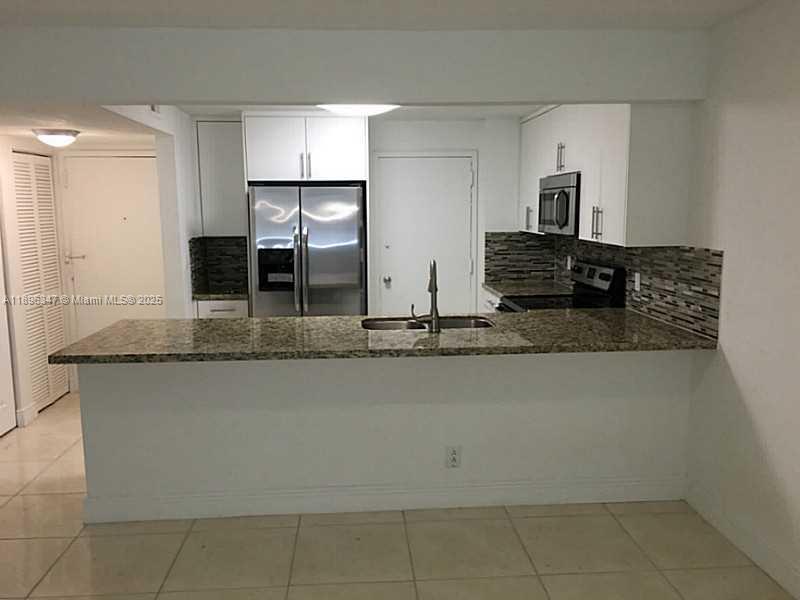 9001 Southwest 77th Avenue, Unit C308 Miami, FL 33156 - Photo 4 of 27 Exterior Front