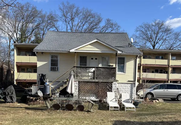 a house view with a garden space