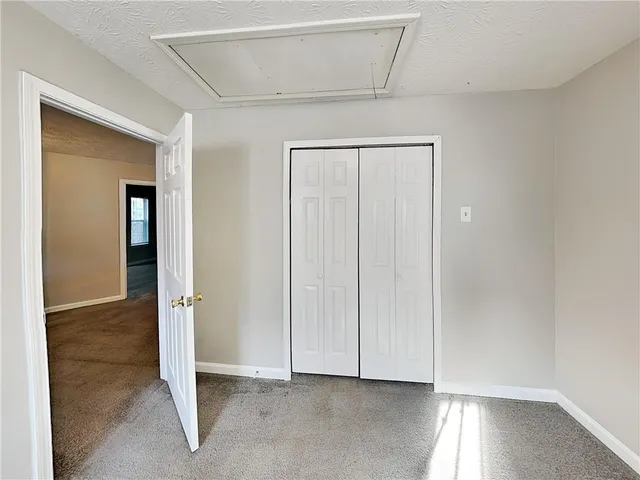 an empty room with closet