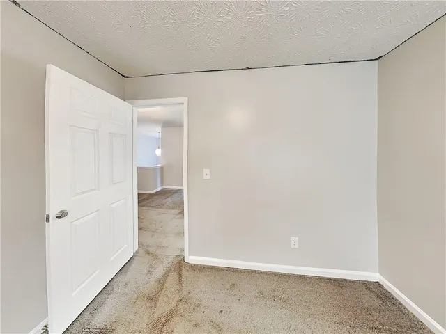 a view of a room with an empty space
