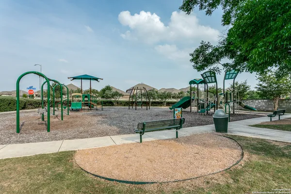 a view of outdoor space with water fountain