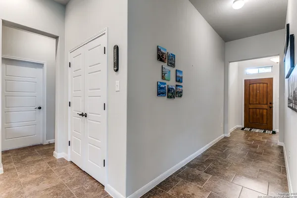 wooden floor with white walls