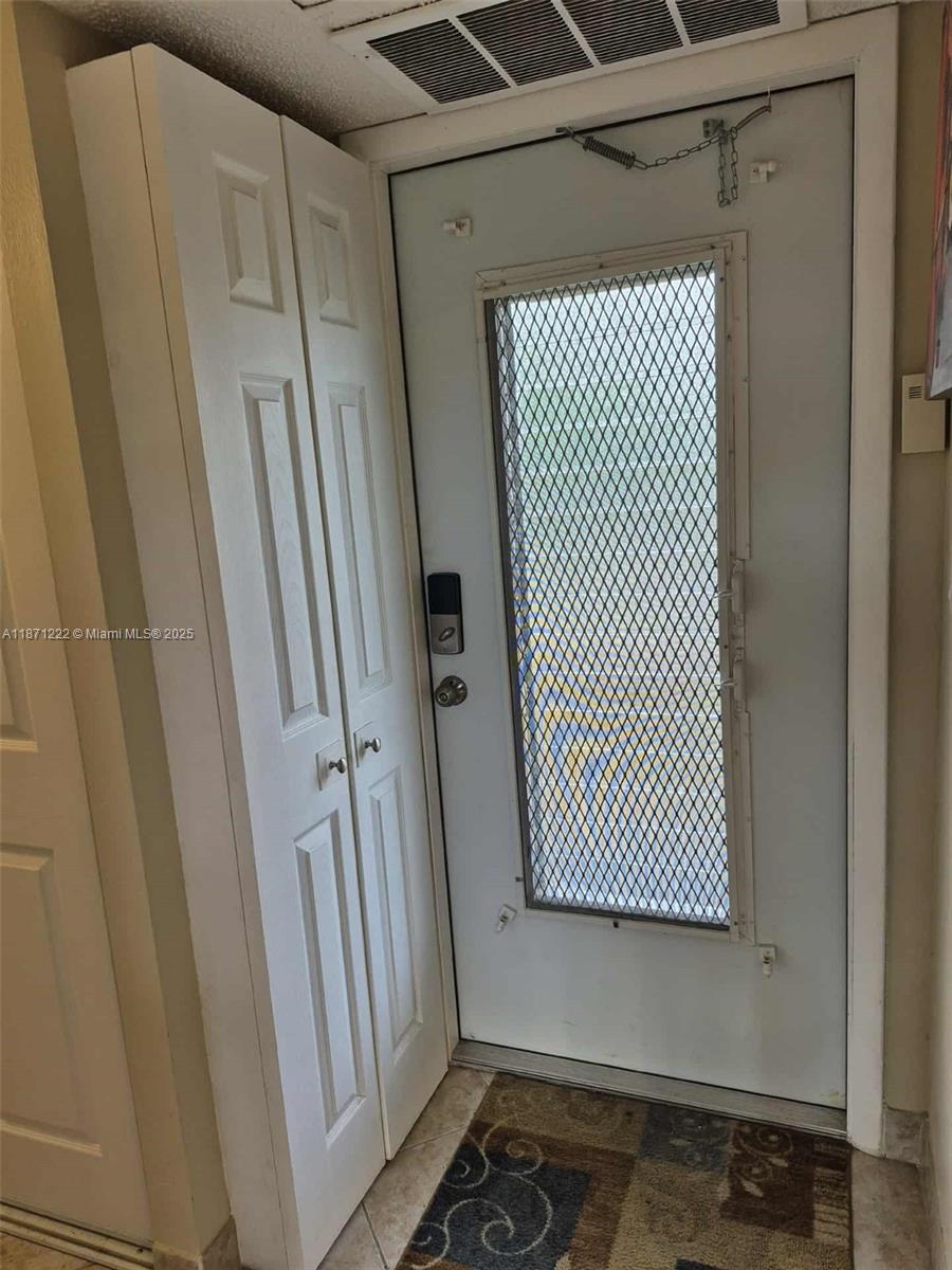 3400 Northwest 48th Avenue, Unit 607 Lauderdale Lakes, FL 33319 - Photo 12 of 17 a bathroom with a sink and a shower