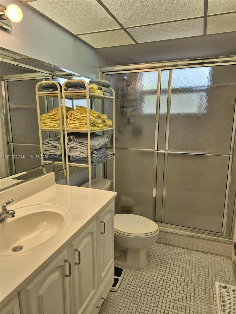 3400 Northwest 48th Avenue, Unit 607 Lauderdale Lakes, FL 33319 - Photo 10 of 17 a bathroom with a sink toilet and shower