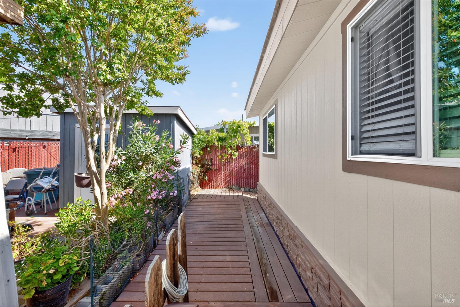 109 Pear Lane, Unit 109 Santa Rosa, CA 95407 - Photo 23 of 27 a view of a house with potted plants